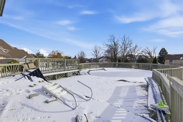 a view of swimming pool with lounge chair in the patio