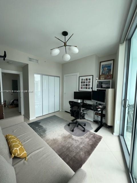 900 Biscayne Boulevard, Unit 4312 Miami, FL 33132 - Photo 15 of 36 a living room with furniture and a piano