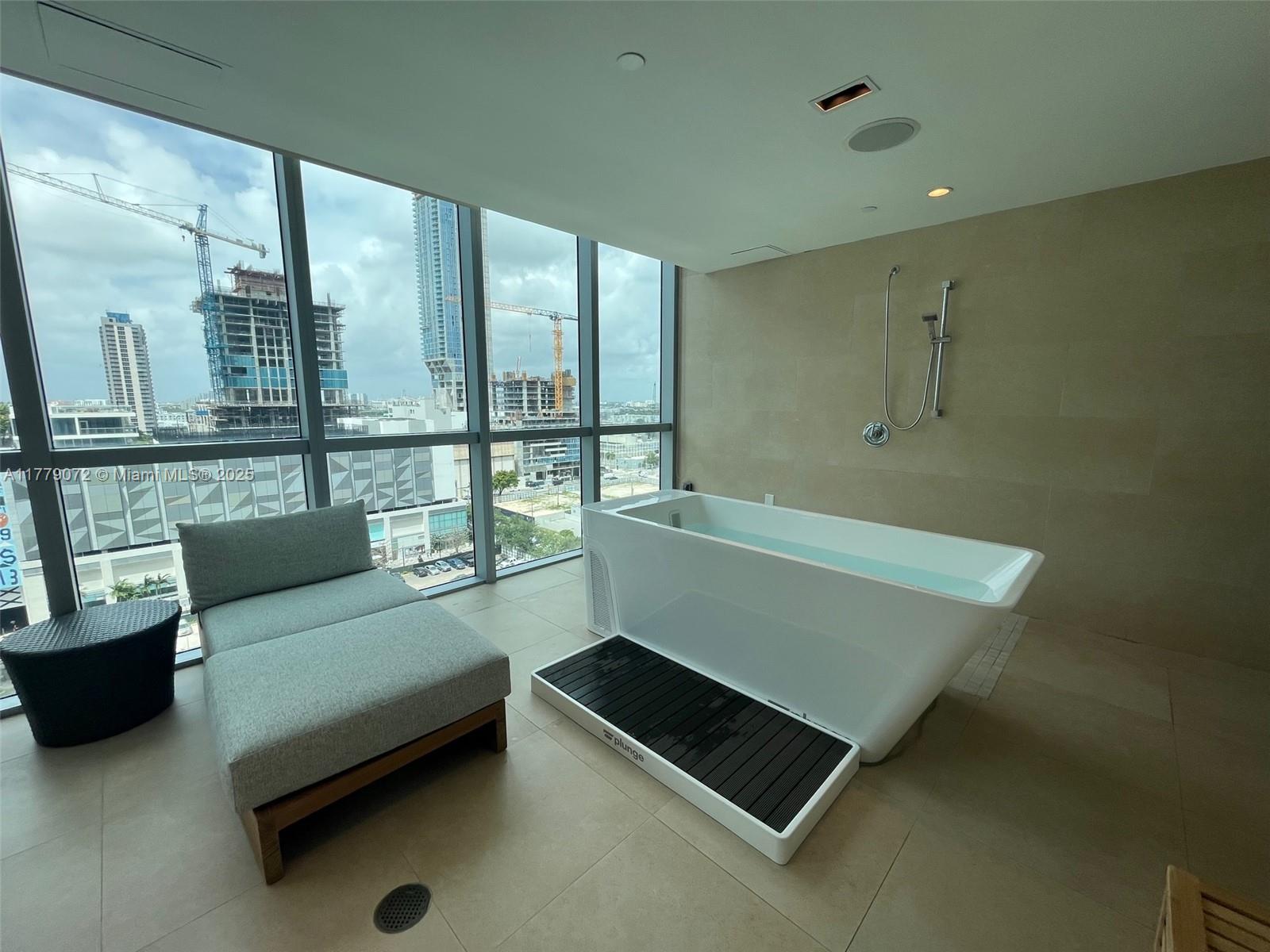 900 Biscayne Boulevard, Unit 4312 Miami, FL 33132 - Photo 30 of 36 a room with pool table and a large window