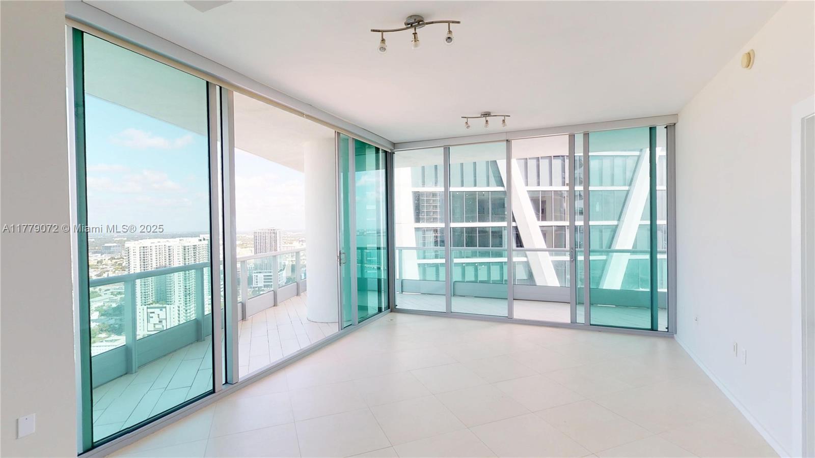 900 Biscayne Boulevard, Unit 4312 Miami, FL 33132 - Photo 3 of 36 a view of a room with natural light