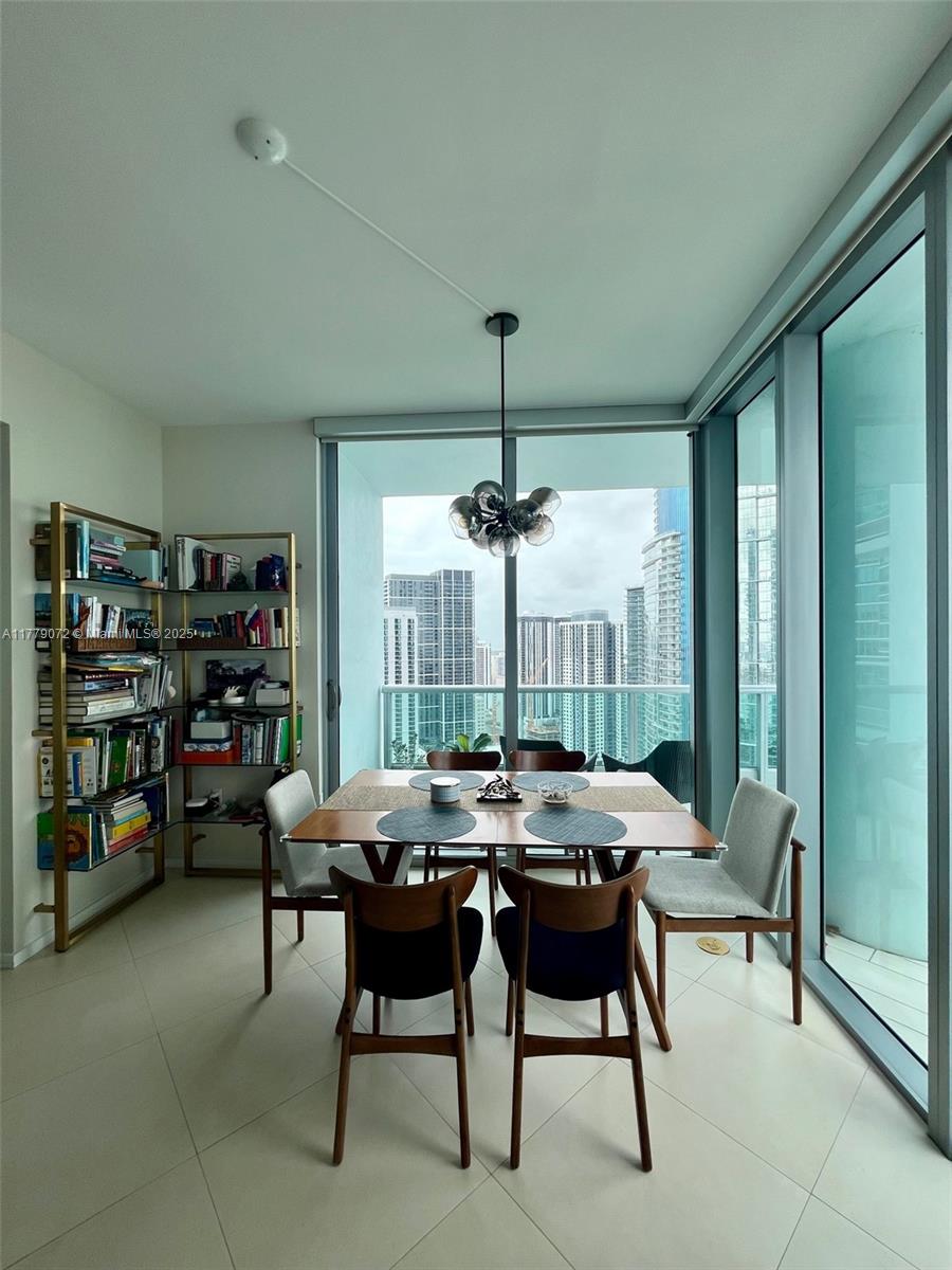 900 Biscayne Boulevard, Unit 4312 Miami, FL 33132 - Photo 6 of 36 a view of a dining room with furniture window and outside view