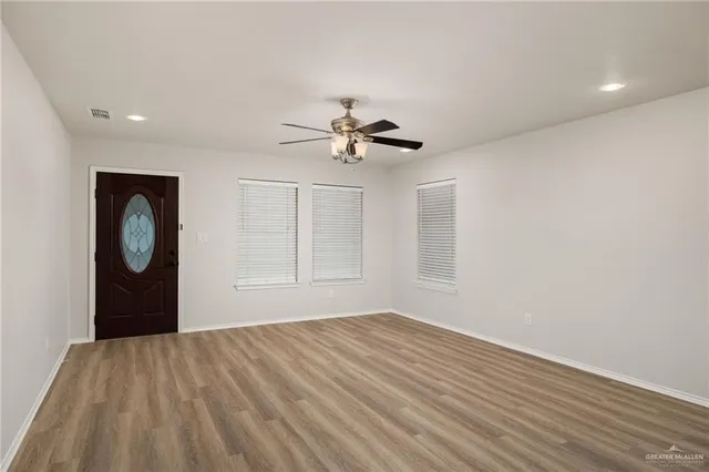 a view of a livingroom with a hardwood floor