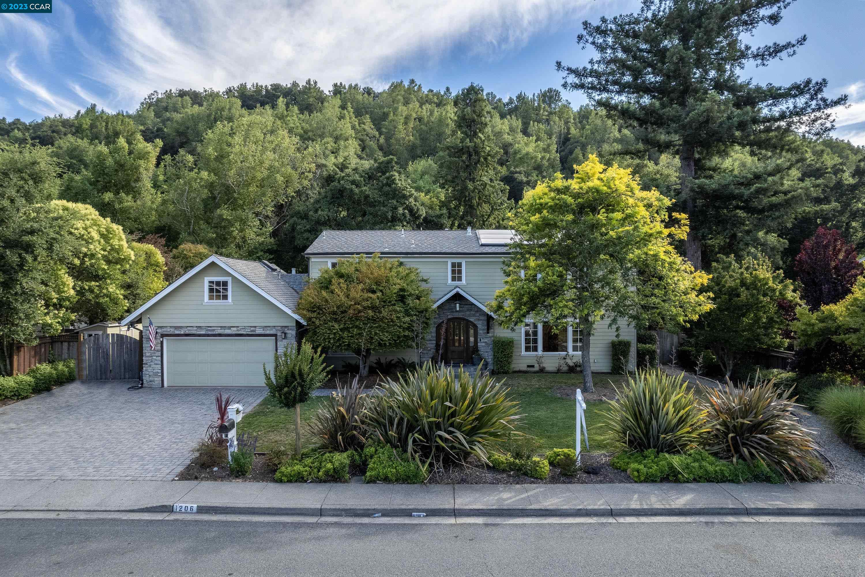 front view of a house with a small yard