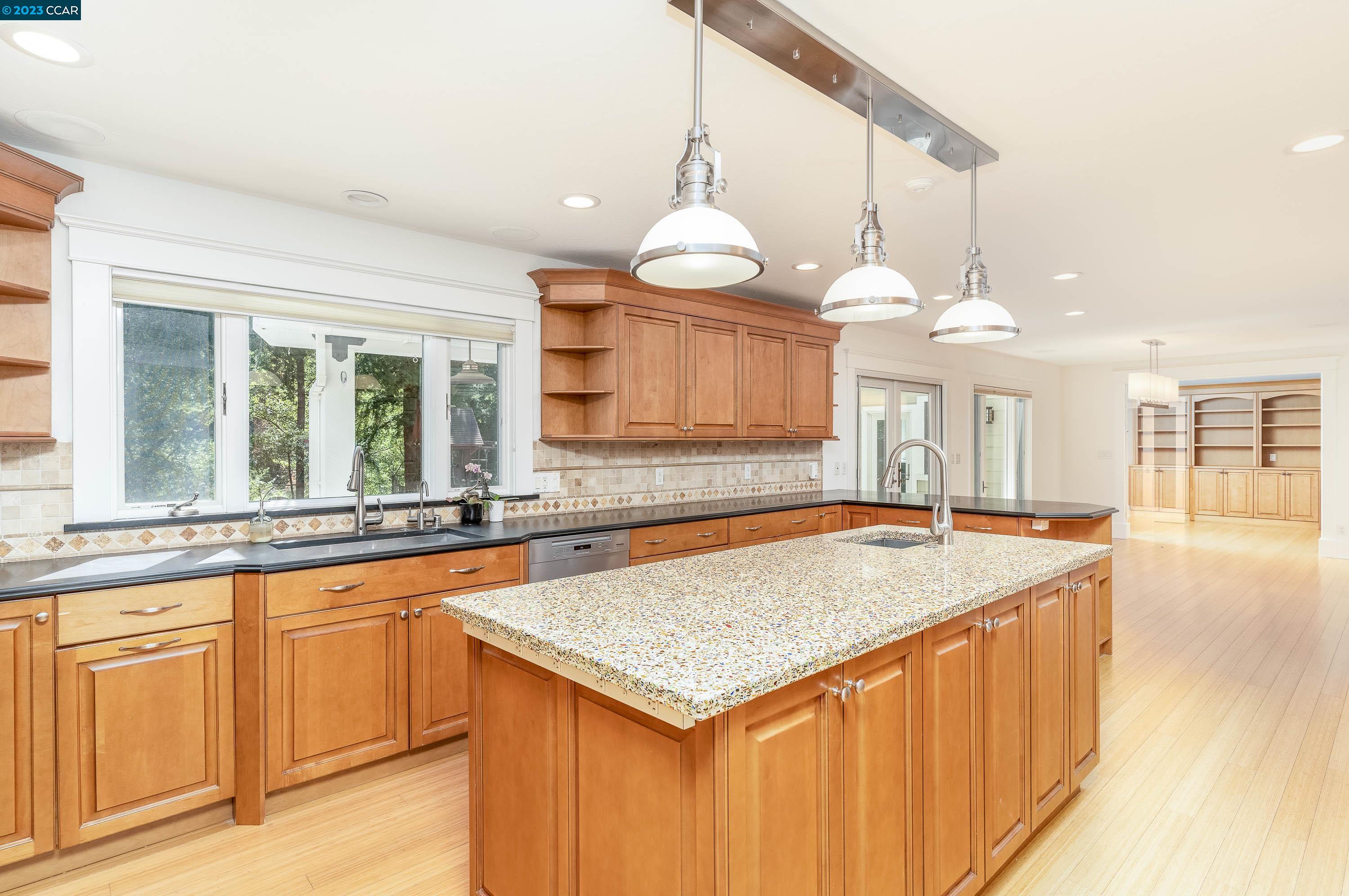 1206 Rimer Drive Moraga, CA 94556 - Photo 11 of 53 a kitchen with a stove a counter space and a sink