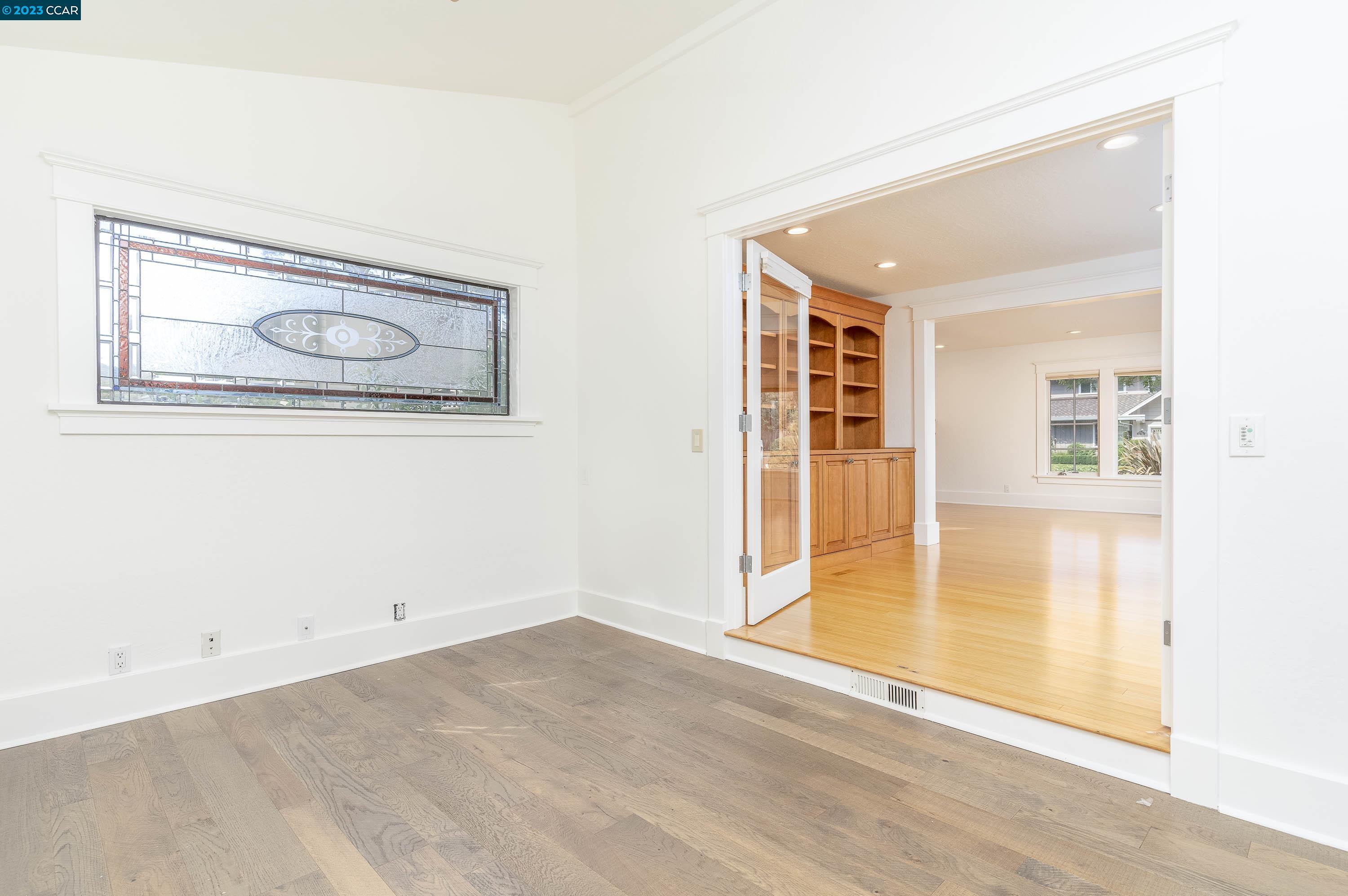 1206 Rimer Drive Moraga, CA 94556 - Photo 18 of 53 an empty room with wooden floor and window