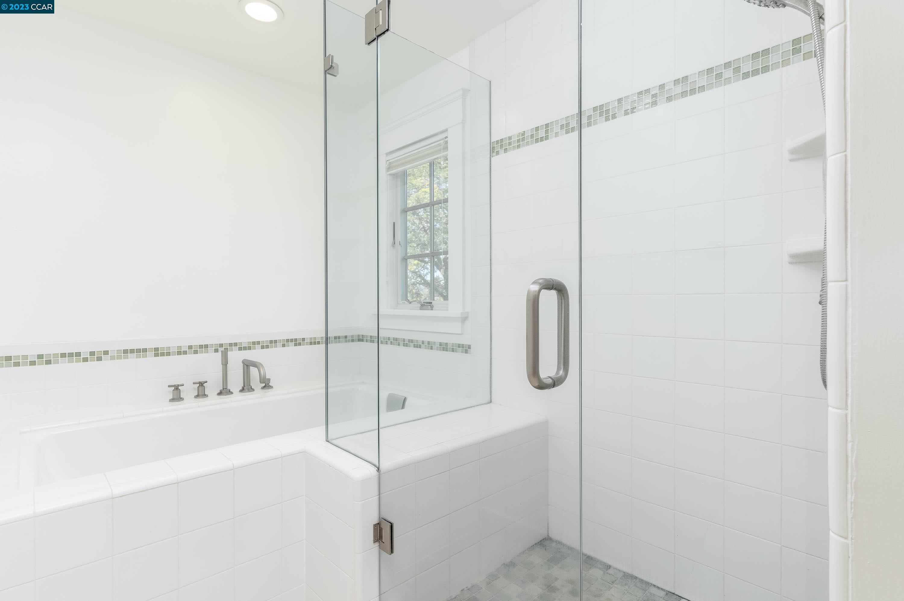 1206 Rimer Drive Moraga, CA 94556 - Photo 22 of 53 a bathroom with a bathtub and a shower