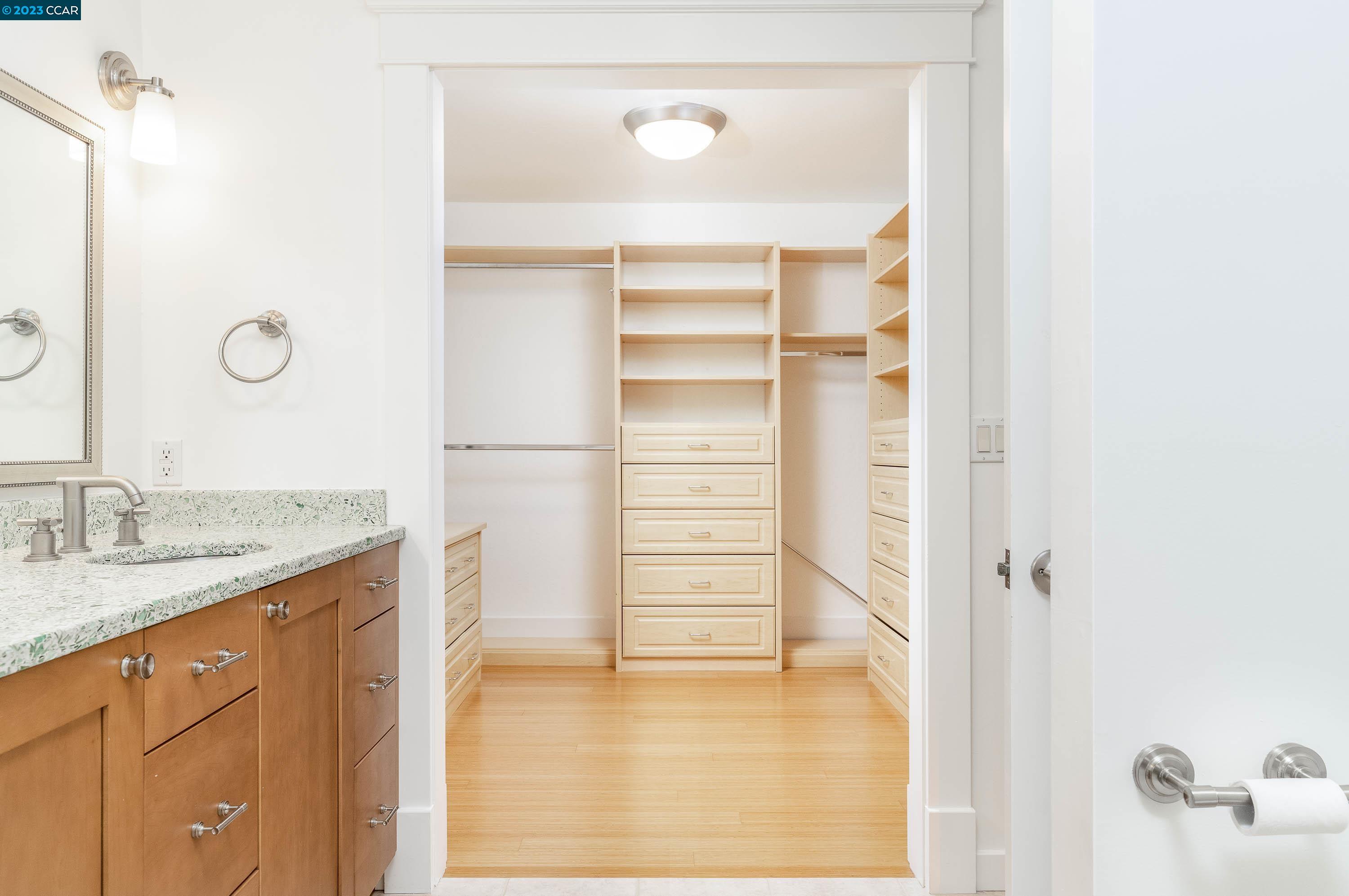 1206 Rimer Drive Moraga, CA 94556 - Photo 24 of 53 a bathroom with a granite countertop sink a mirror and a