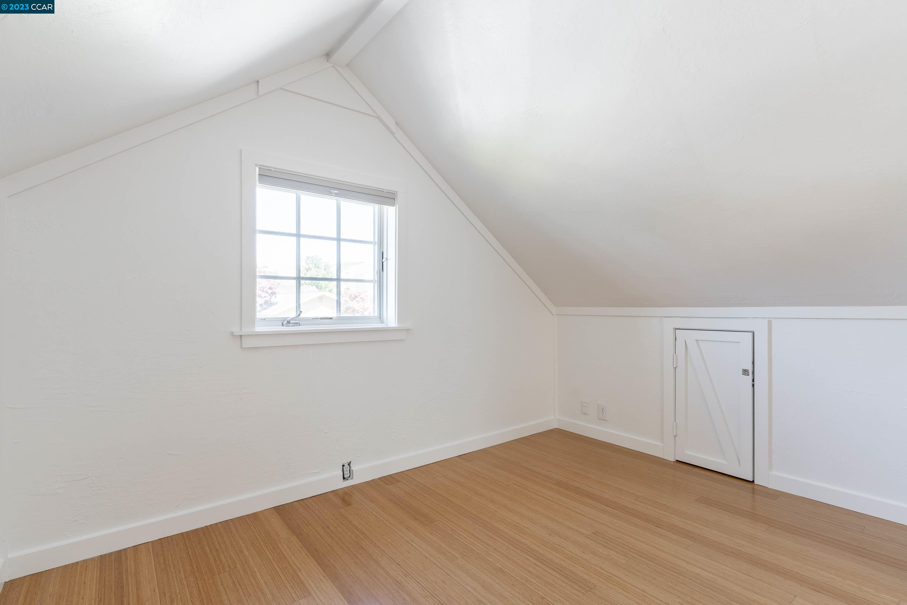 1206 Rimer Drive Moraga, CA 94556 - Photo 34 of 53 an empty room with wooden floor and windows