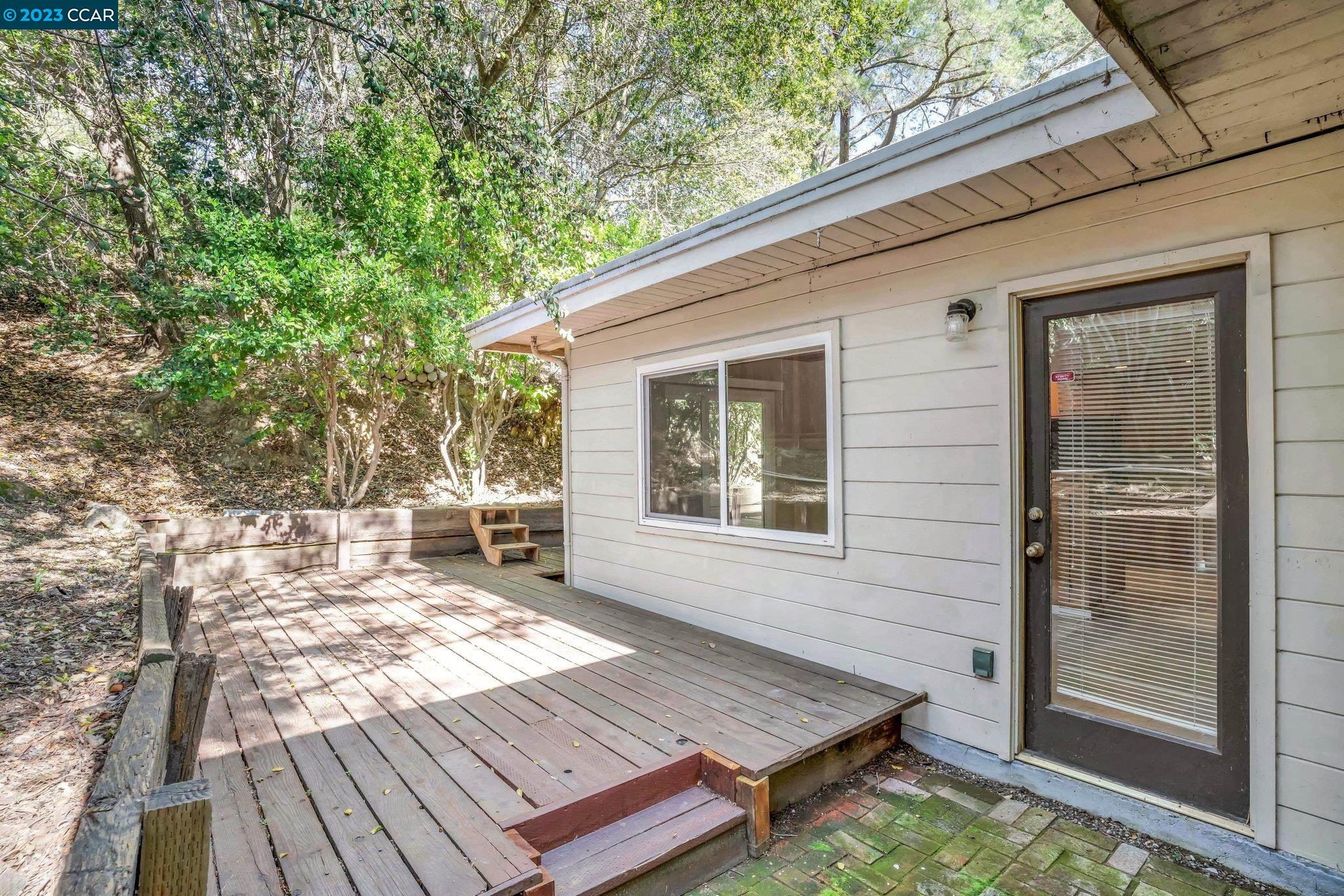 928 Janet Lane Lafayette, CA 94549 - Photo 29 of 33 a view of a backyard with a patio