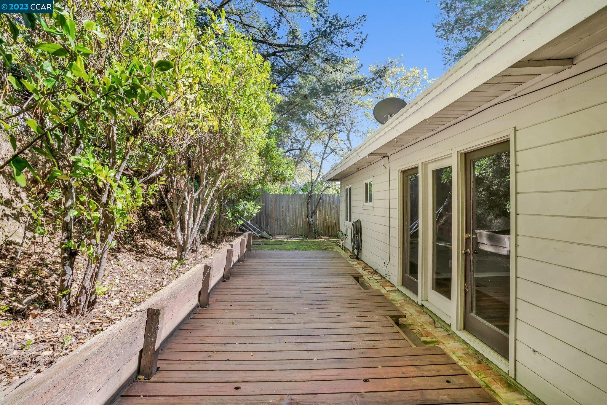 928 Janet Lane Lafayette, CA 94549 - Photo 30 of 33 a view of a house with wooden deck