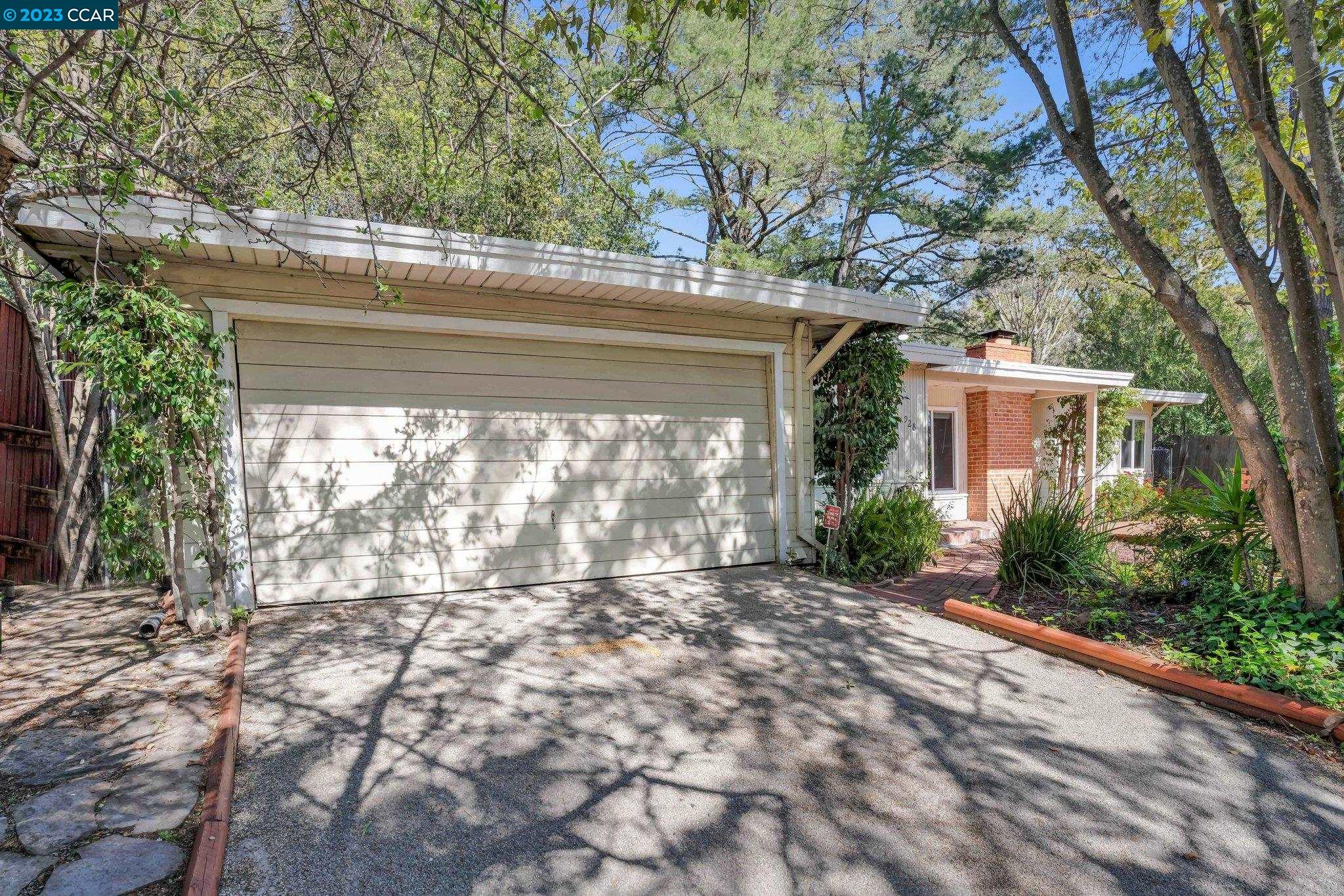 928 Janet Lane Lafayette, CA 94549 - Photo 33 of 33 a view of a house with a tree in the yard