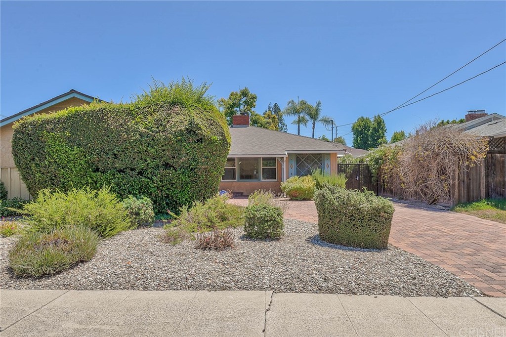 4906 Van Noord Avenue Sherman Oaks, CA 91423 - Photo 2 of 39 a front view of a house with a yard