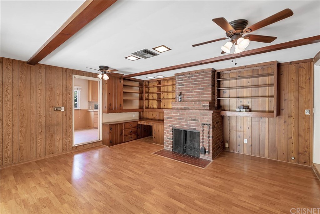 4906 Van Noord Avenue Sherman Oaks, CA 91423 - Photo 21 of 39 a living room with stainless steel appliances kitchen island granite countertop furniture wooden floor and a large window
