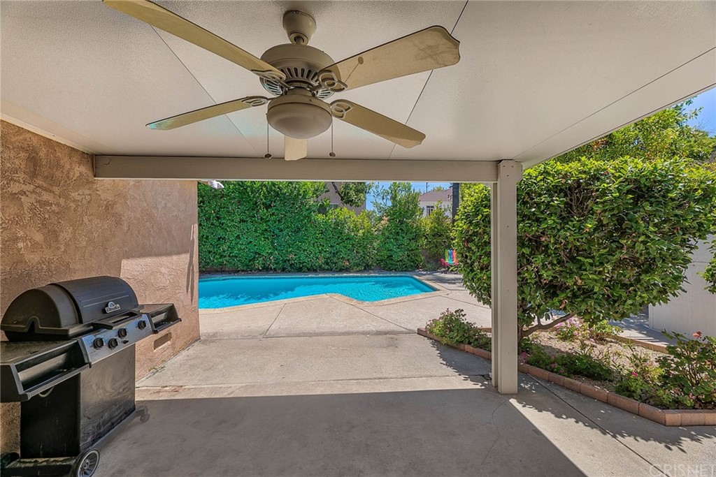 4906 Van Noord Avenue Sherman Oaks, CA 91423 - Photo 33 of 39 a view of a livingroom with furniture and floor to ceiling window