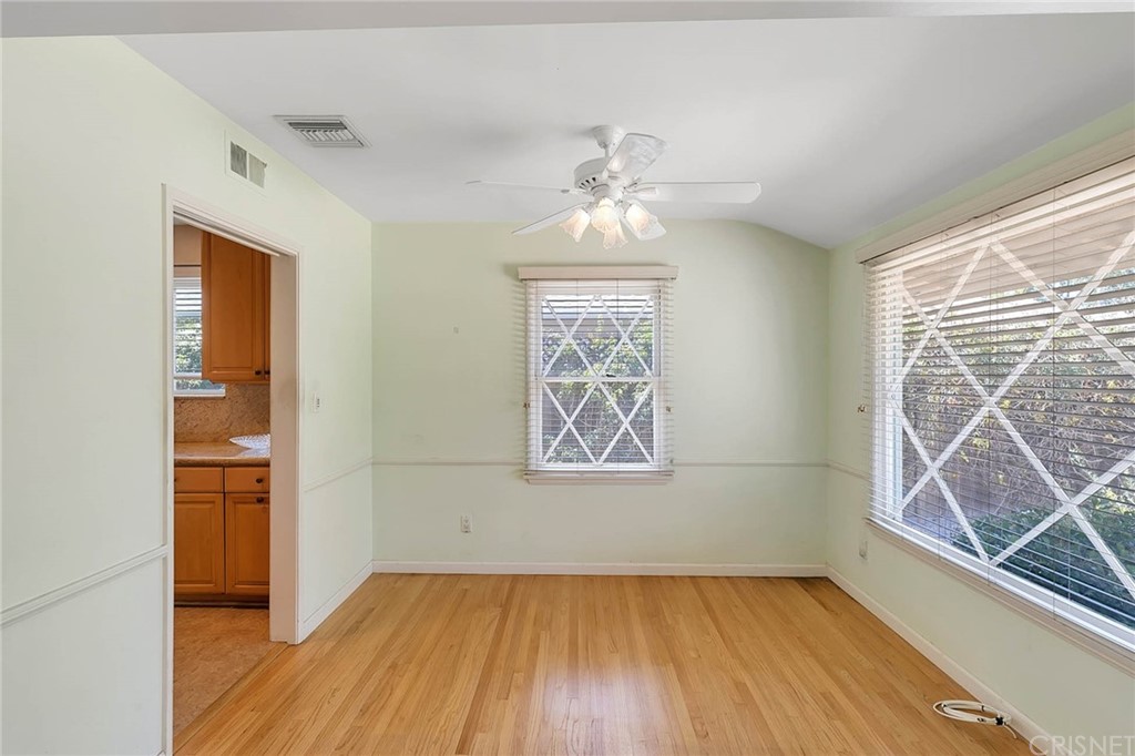 4906 Van Noord Avenue Sherman Oaks, CA 91423 - Photo 8 of 39 wooden floor in an empty room with a window