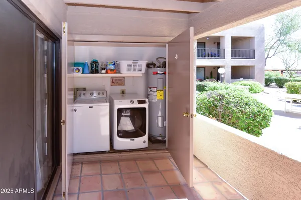 a utility room with dryer and washer