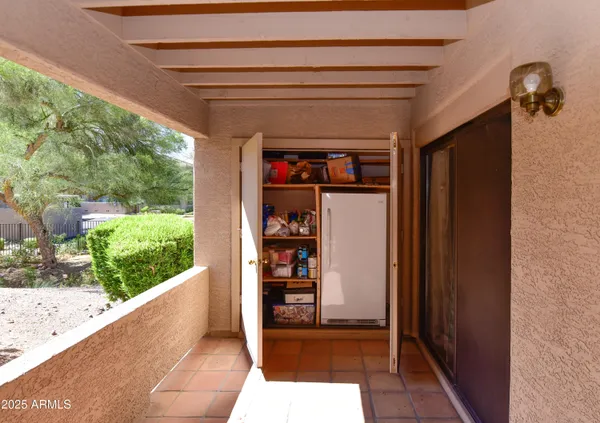 a view of a door and the window