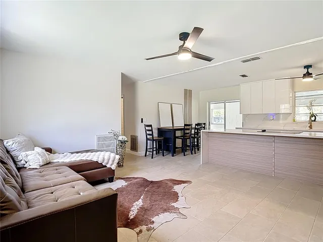 a view of a dining room with furniture and a table