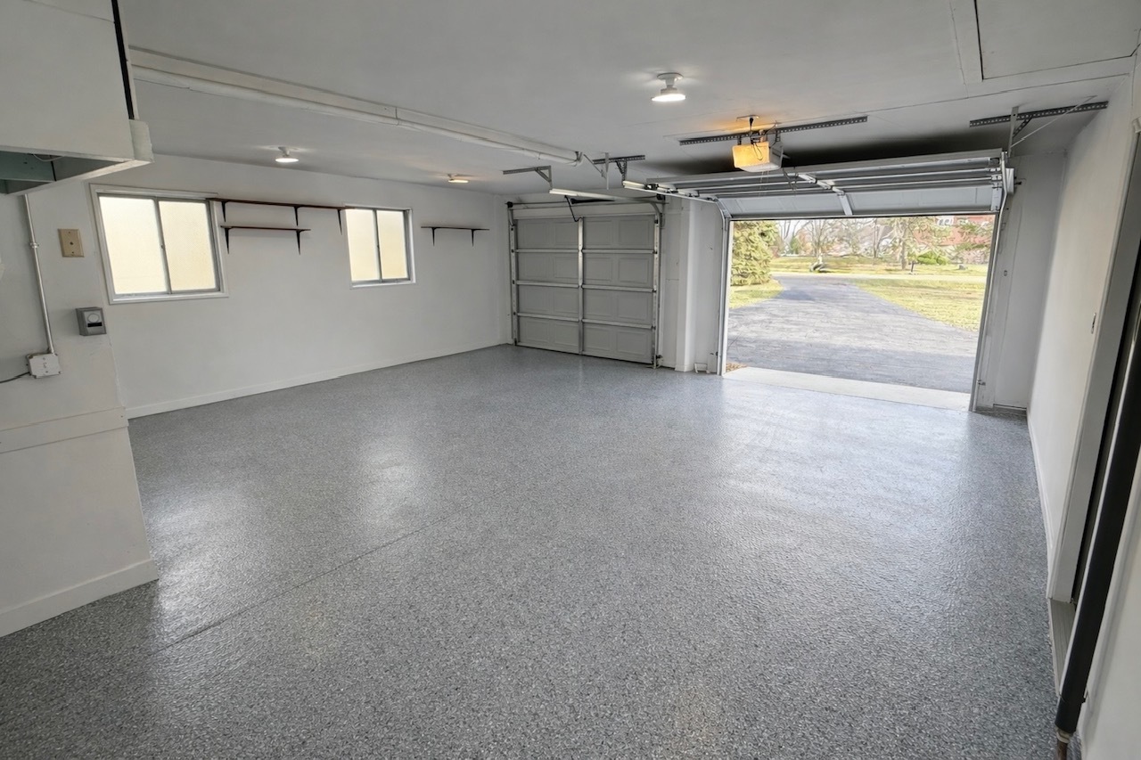 126 Rosedale Court Bloomingdale, IL 60108 - Photo 23 of 26 a view of empty room with window and wooden floor