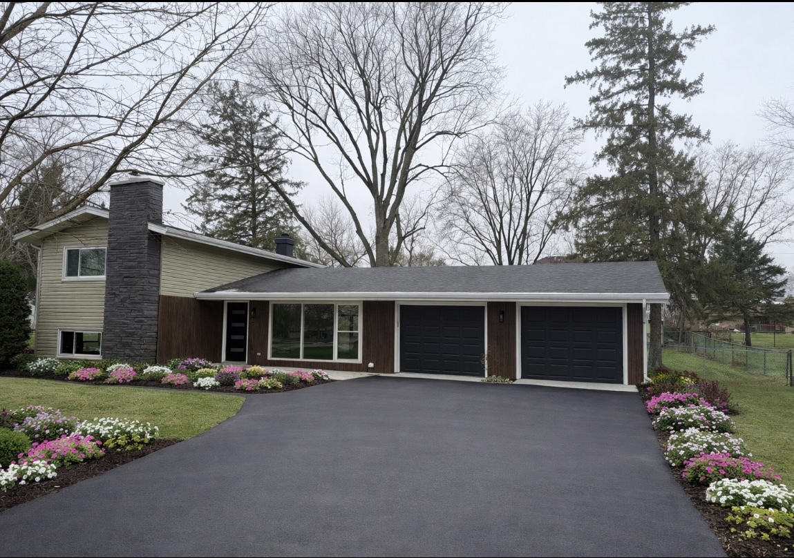 126 Rosedale Court Bloomingdale, IL 60108 - Photo 25 of 26 a front view of a house with garden and porch