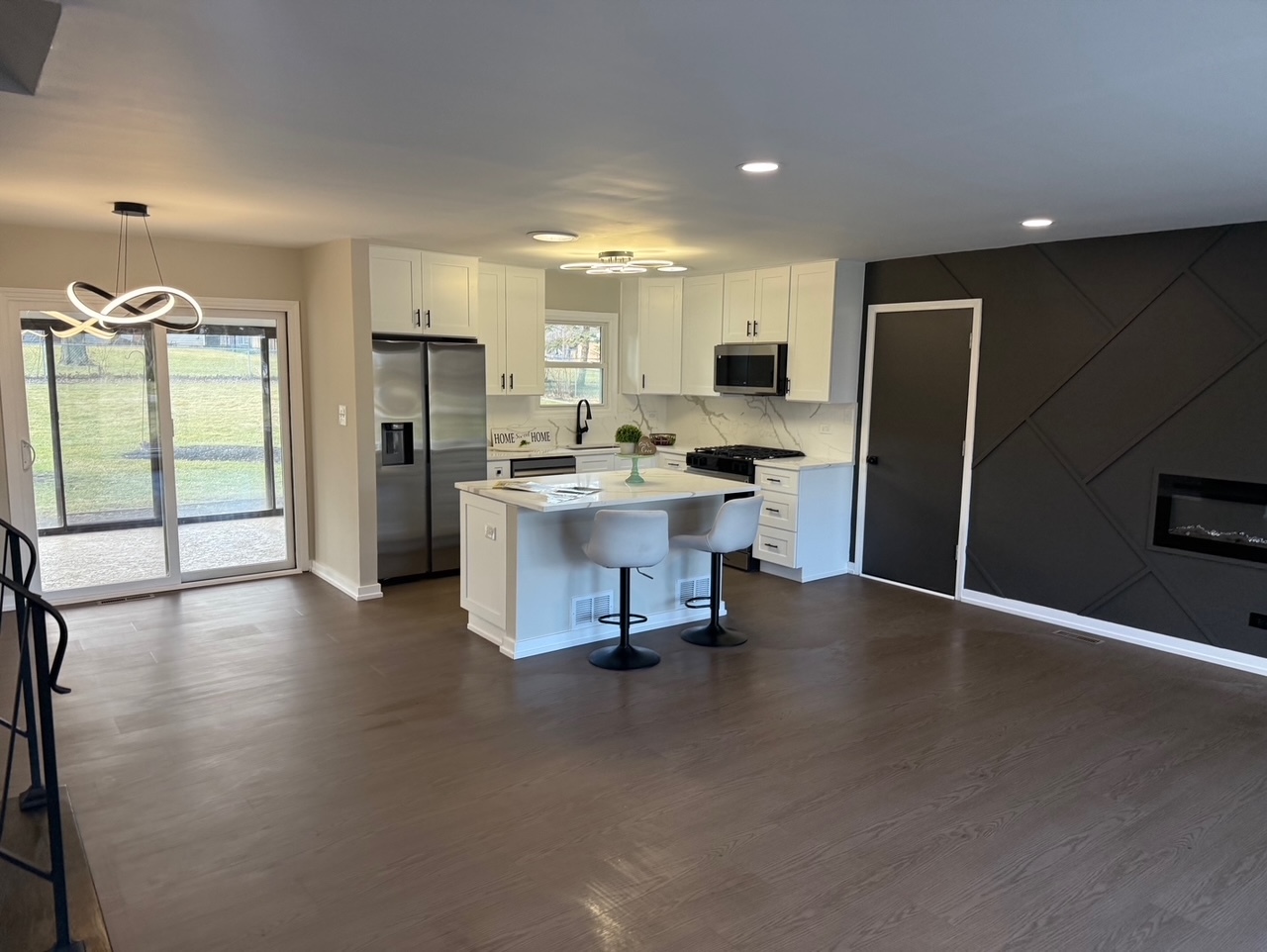 126 Rosedale Court Bloomingdale, IL 60108 - Photo 8 of 26 a view of a kitchen with refrigerator and television