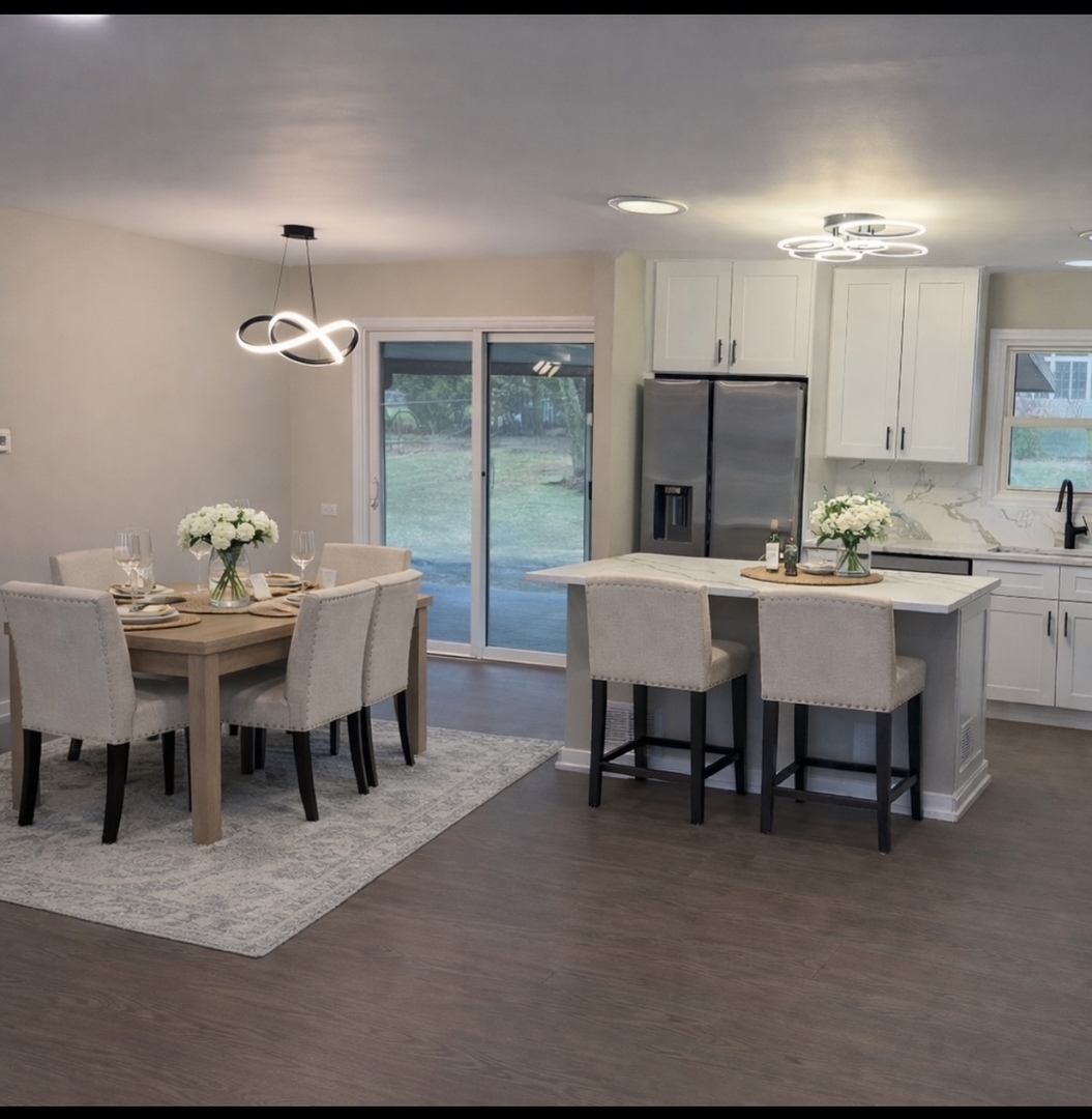 126 Rosedale Court Bloomingdale, IL 60108 - Photo 9 of 26 a view of a dining room with furniture