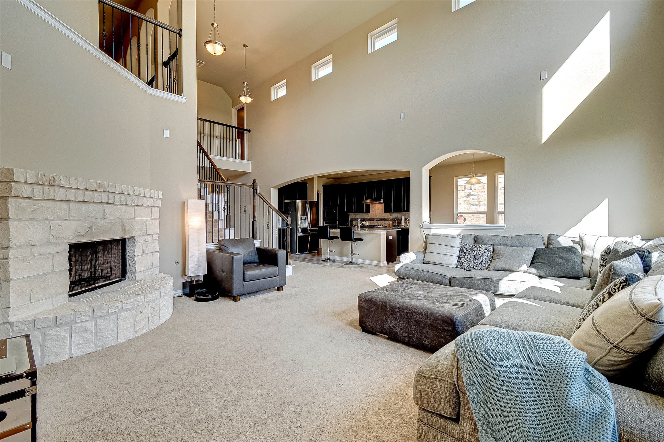 907 River Delta Lane Rosenberg, TX 77469 - Photo 13 of 49 a living room with furniture fireplace and a fireplace
