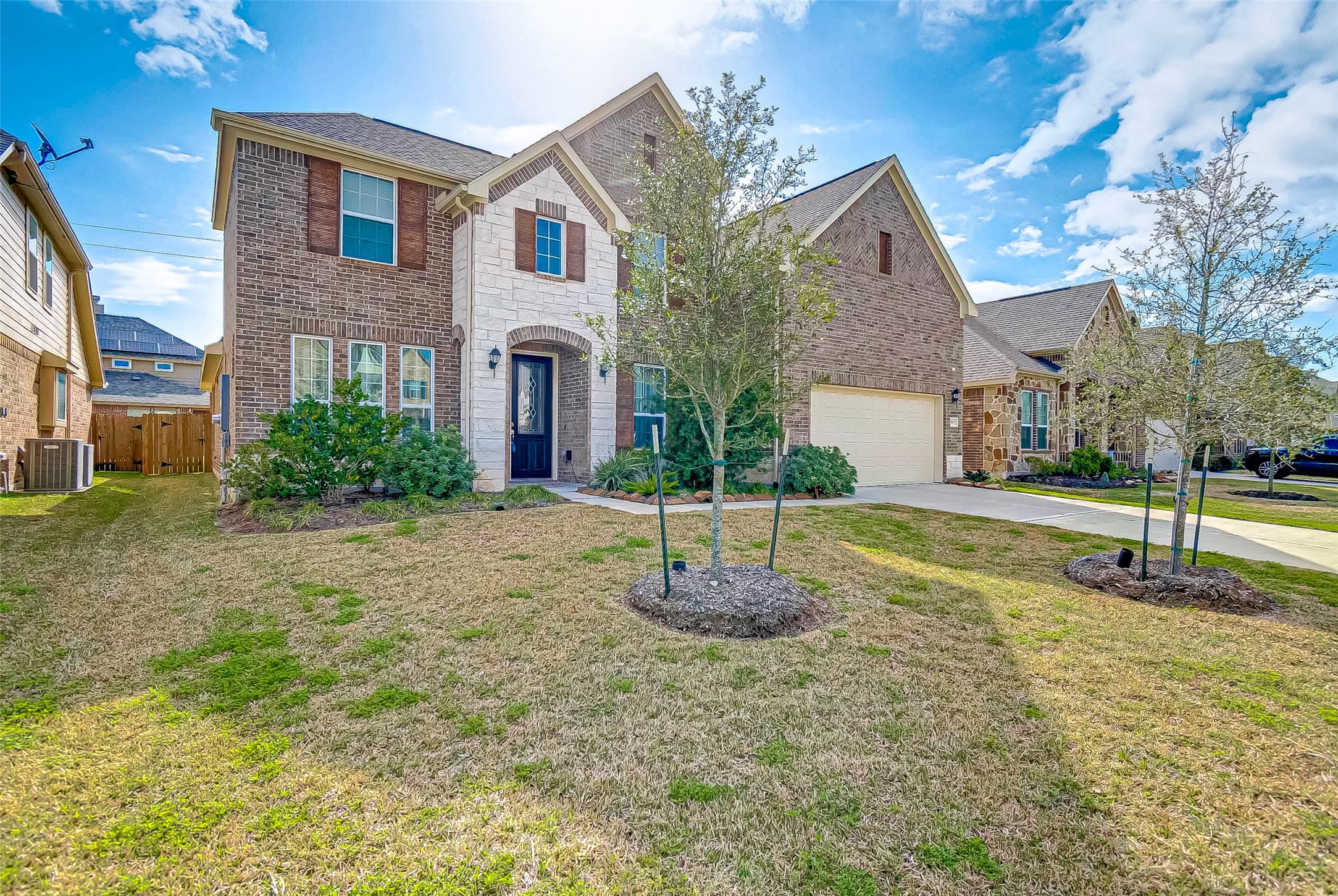 907 River Delta Lane Rosenberg, TX 77469 - Photo 2 of 49 a house view with a garden space