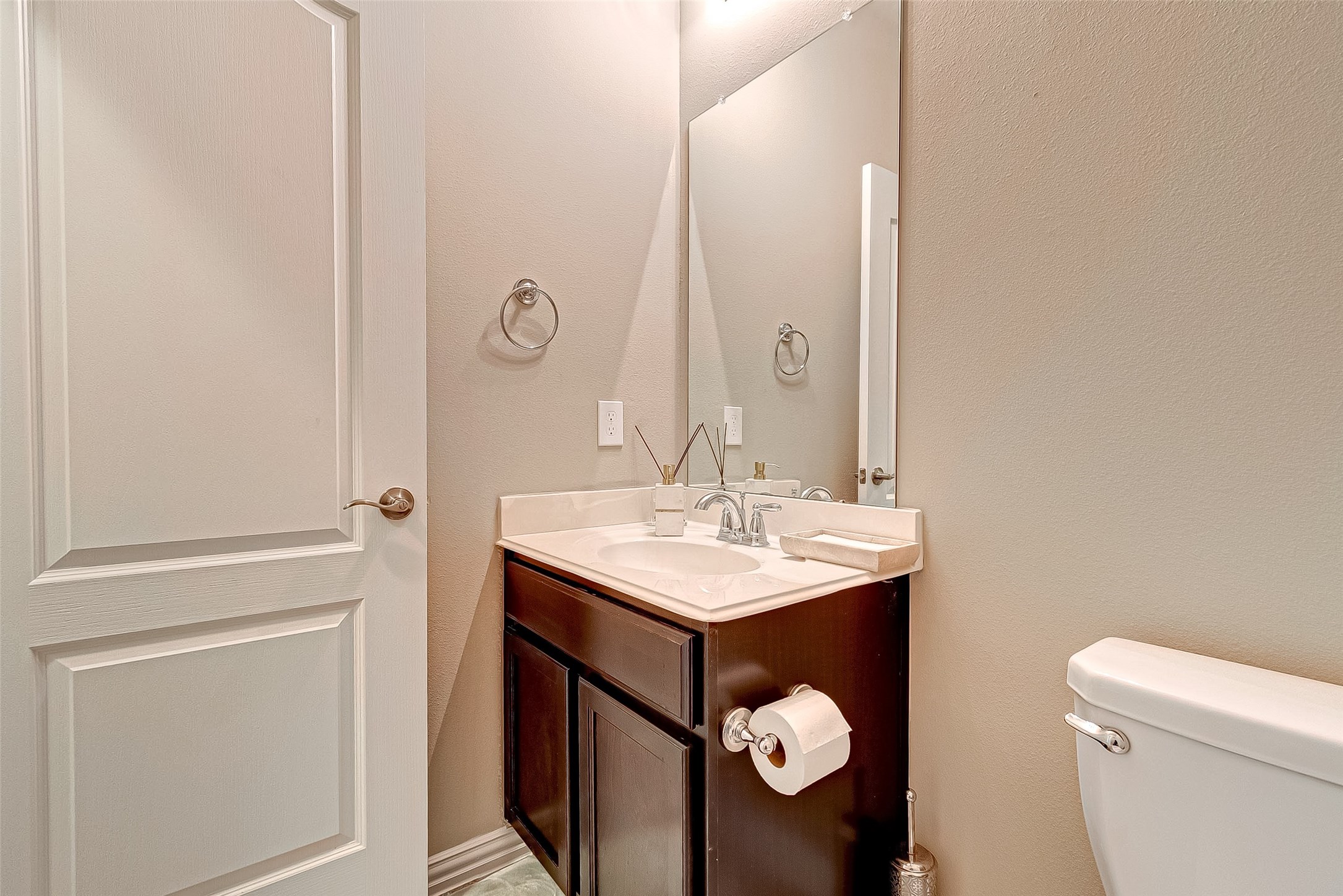 907 River Delta Lane Rosenberg, TX 77469 - Photo 24 of 49 a bathroom with a sink and mirror with toilet