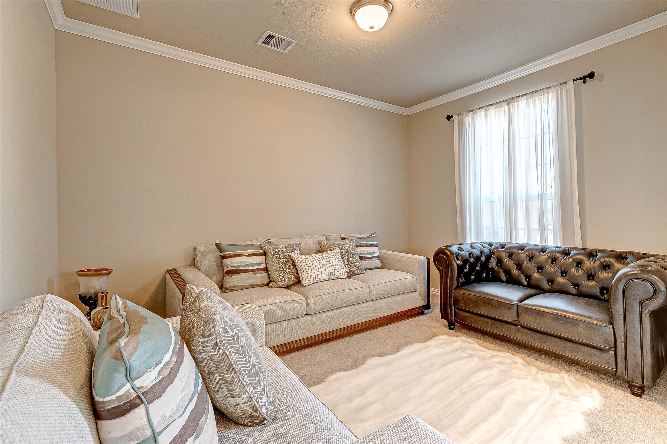 907 River Delta Lane Rosenberg, TX 77469 - Photo 8 of 49 a living room with furniture and a window