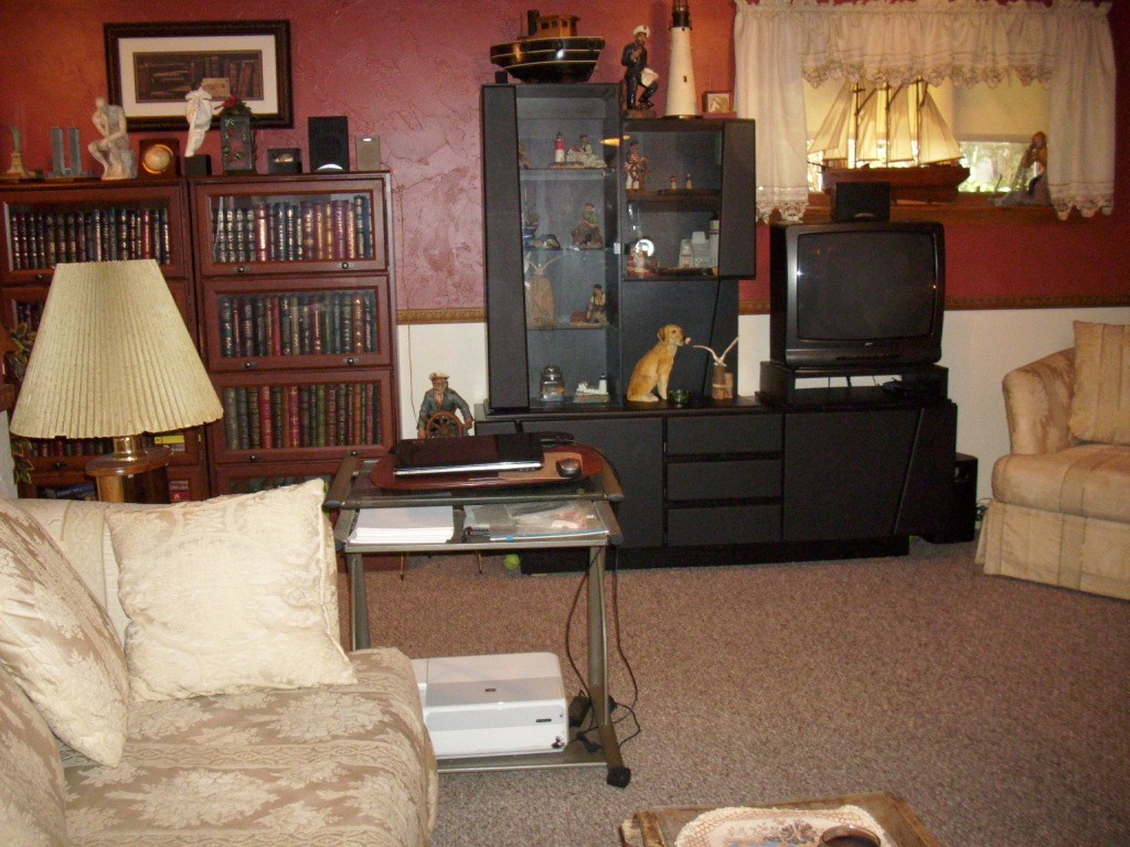 902 Irving Road, Unit 902 Randolph, MA 02368 - Photo 14 of 15 a living room with furniture and a lamp