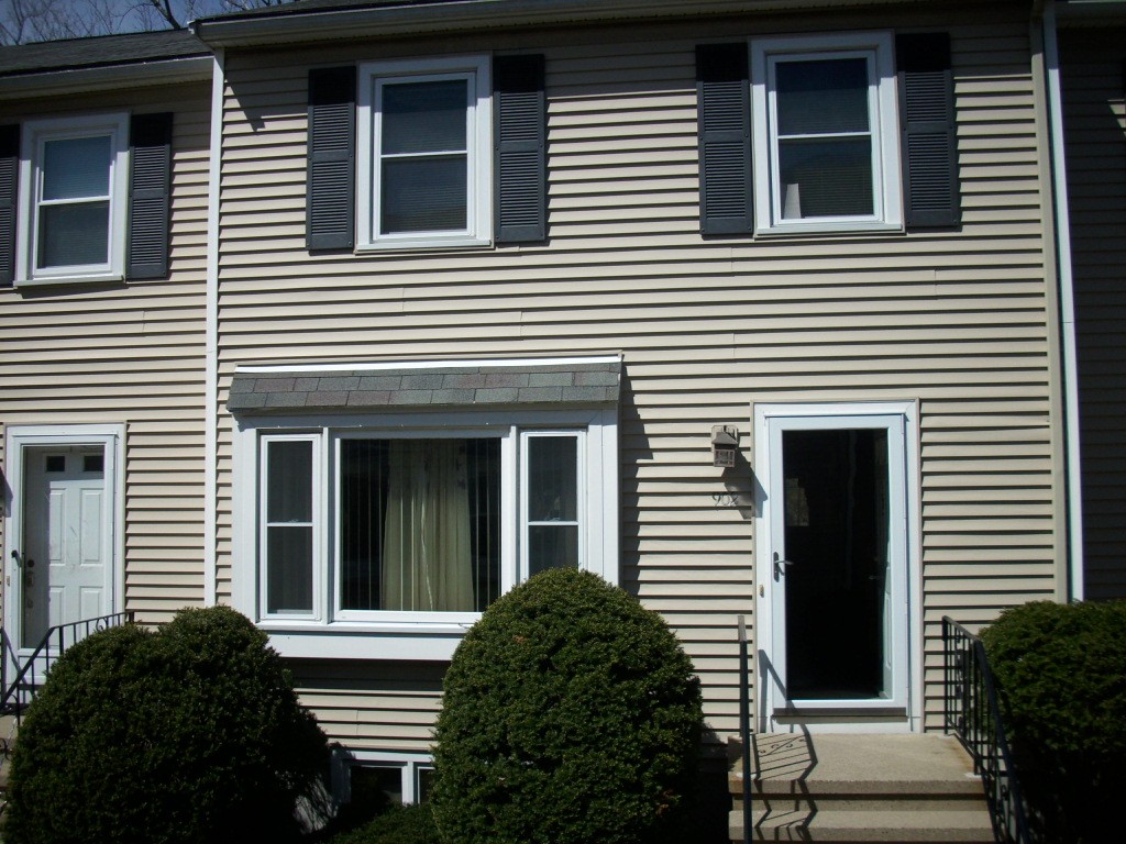 902 Irving Road, Unit 902 Randolph, MA 02368 - Photo 2 of 15 a view of a windows in back of the house