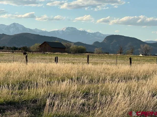 a view of lake with mountain