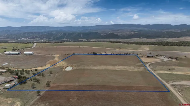a view of a swimming pool and mountain view