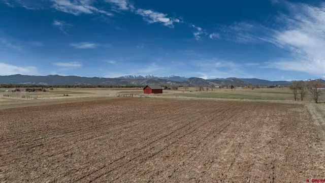 a view of an ocean and a mountain