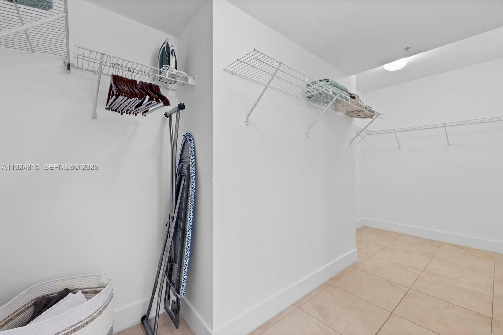 41 Southeast 5th Street, Unit 510 Miami, FL 33131 - Photo 32 of 38 a view of walk in closet