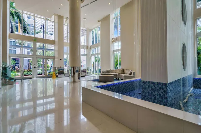 a view of a living room and dining room