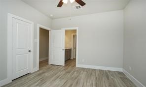 1905 Lonestar Brook Lane Houston, TX 77080 - Photo 16 of 23 a view of empty room with wooden floor