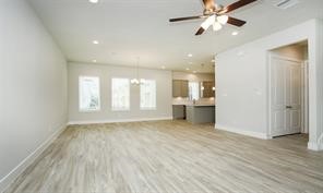 1905 Lonestar Brook Lane Houston, TX 77080 - Photo 5 of 23 a view of an empty room with a window