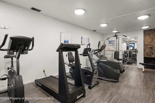 a view of a room with gym equipment