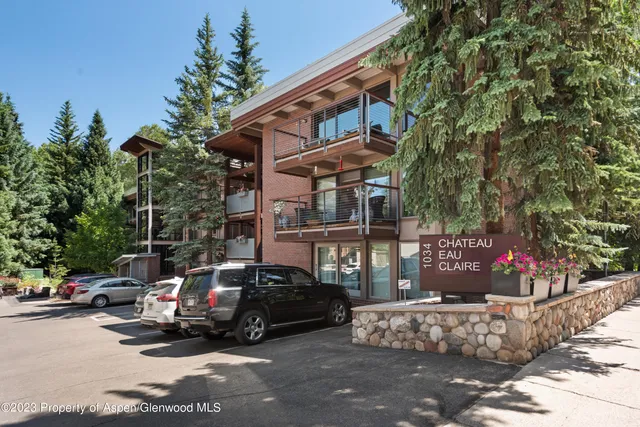 a car parked in front of a house