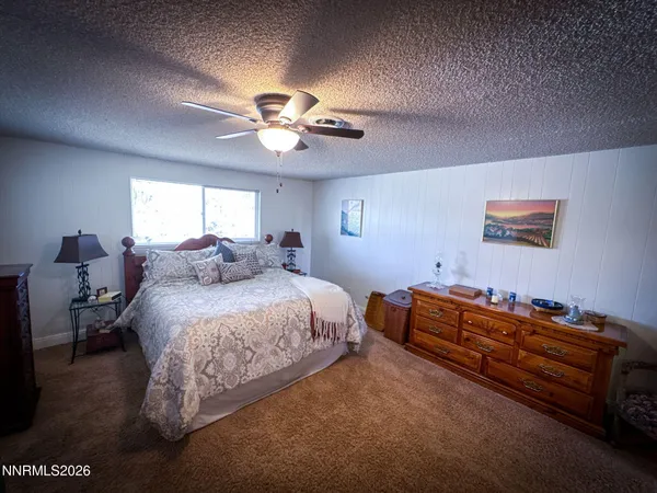 a bathroom with a toilet and a sink