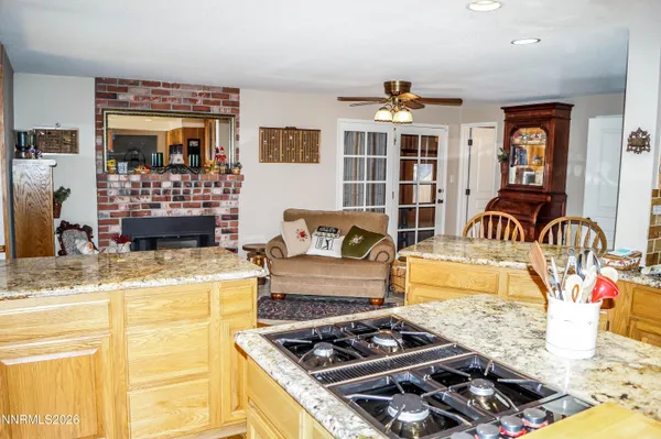 a bedroom with furniture and a flat screen tv