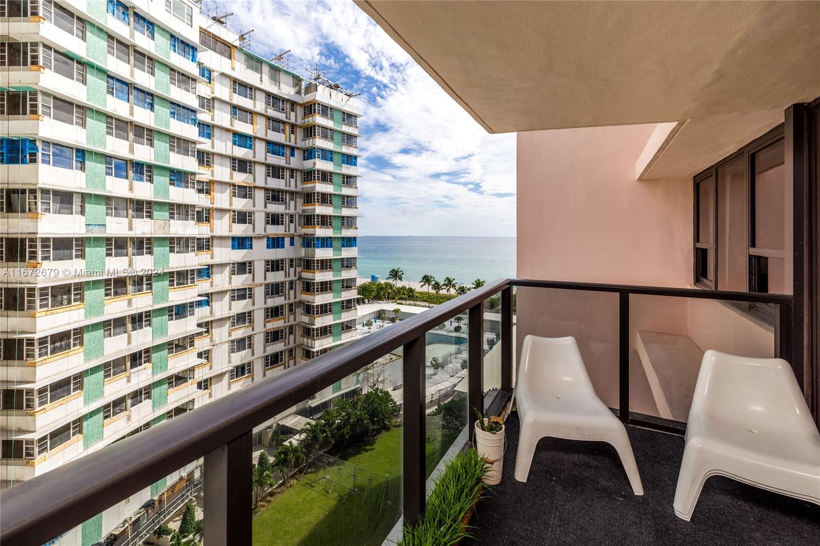 5225 Collins Avenue, Unit 1114 Miami Beach, FL 33140 - Photo 18 of 49 a view of balcony with furniture