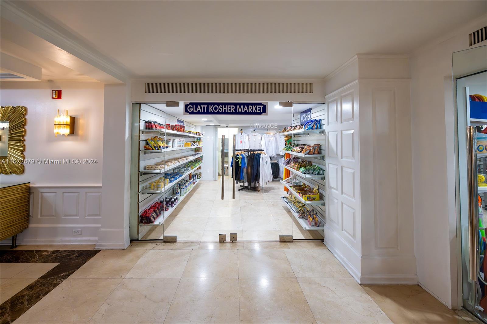 5225 Collins Avenue, Unit 1114 Miami Beach, FL 33140 - Photo 28 of 49 a view of water heater room with air conditioner