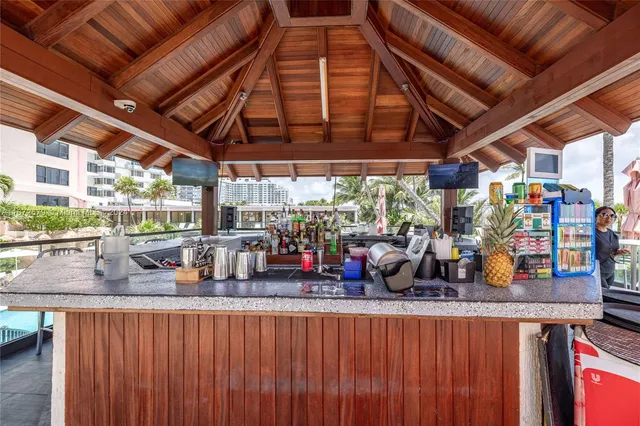 a view of a park with iron fence