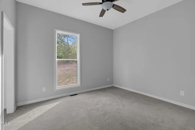 an empty room with a window