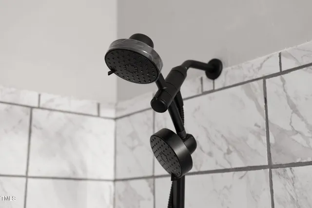 a view of a house with a yard and a garden