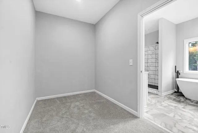 a aerial view of a house with a yard