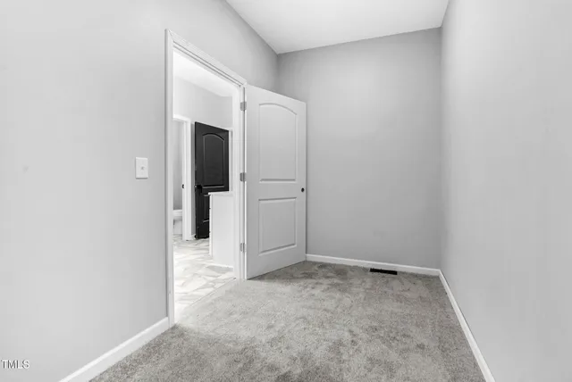 a aerial view of a house with a yard